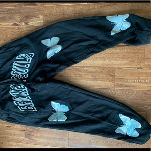 Black and white joggers with butterflies